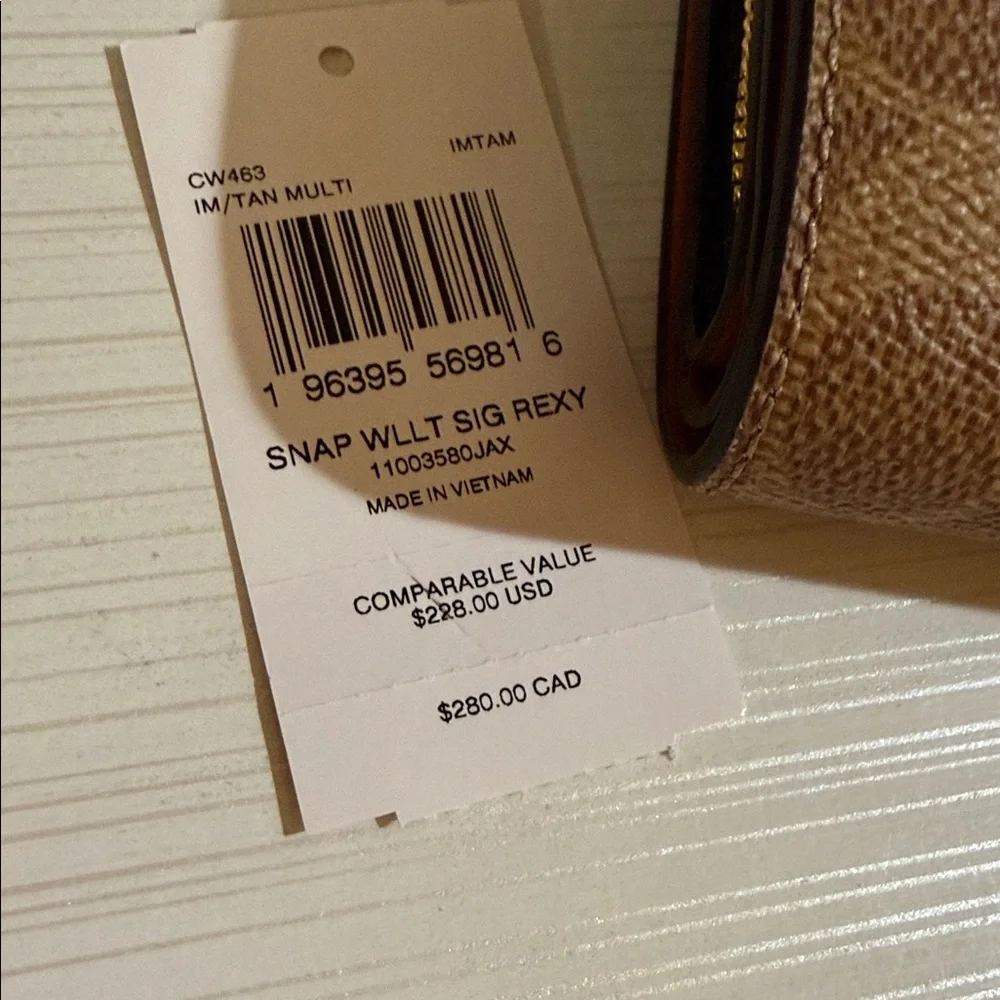 Coach Snap Wallet In Signature Canvas with Rexy Print. $228 msrp - Picture 3 of 11